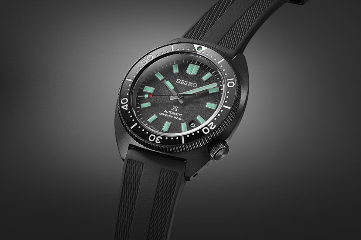 Seiko Prospex Divers Black Series Limited Edition SPB335J1 on a grey background